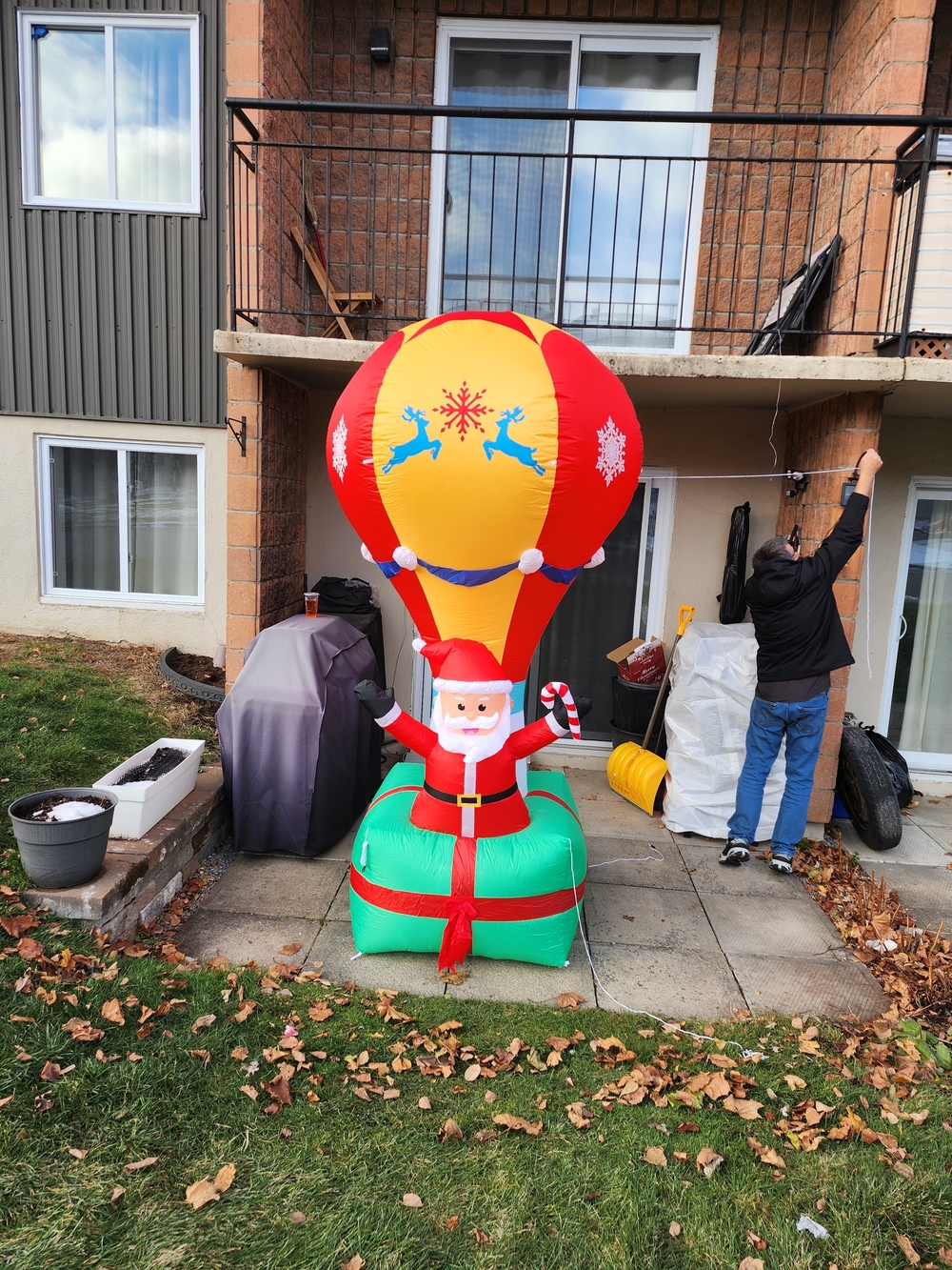 Inflatable Santa in Red and Yellow Hot Air Balloon - Holiday Decoration